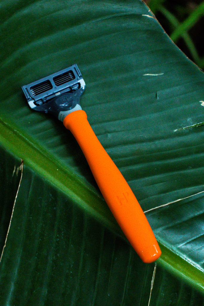 Lifestyle---Orange-razor-on-leaf-(square)